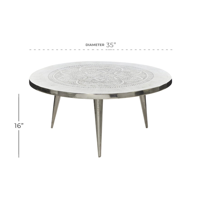 Round Silver Aluminum Coffee Table with Floral Engraving and Tripod Legs, 35x16 Inch